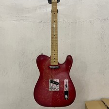 Red TLelectric guitarwith chrome hardwareand maple fretboard.Fast shipping.