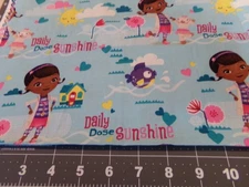 1 /2 YD  X  42" VINTAGE DOC Mc STUFFINS DAILY DOSE OF SUNSHINE/DISNEY COTTON#857