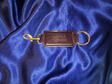 TRES RARE PORTE-CLÉS/PORTE-CLÉS OFFICIEL XENA SECURITY - CUIR VÉRITABLE BORDEAUX
