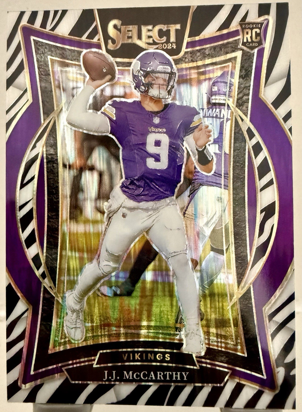 2024 Panini Select - Concourse J.J. McCarthy #24 Zebra Shock Prizm (RC)