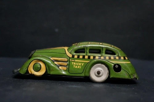 VINTAGE MARX TRICKY TAXI TIN LITHO WIND UP TOY CAR WORKS GREAT