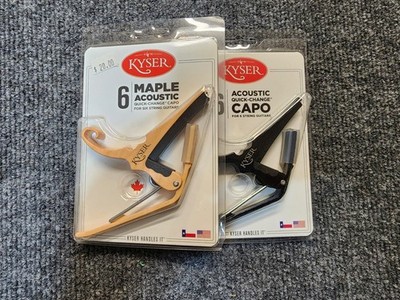 Two Kyser acoustic guitar capos