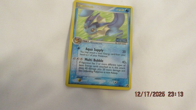 vaporeon pokemon card 19/115 holo unseen forces 2005 near mint