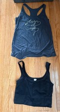 black sports bra and grey racerback workout tee