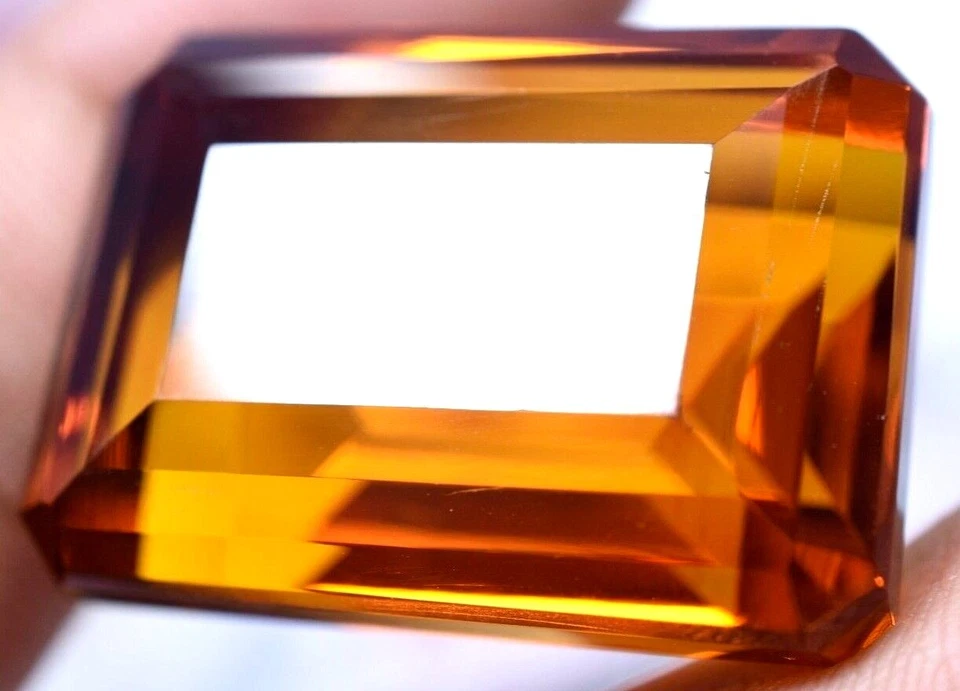 Lab created 89.50 Ct Splendid Golden Orange Topaz GGL Certified Emerald Cut Gem Foto 2 de 4
