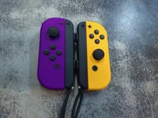 Official Nintendo Switch / OLED Joy-Con - Neon Orange and Purple Joy Con HAC-016