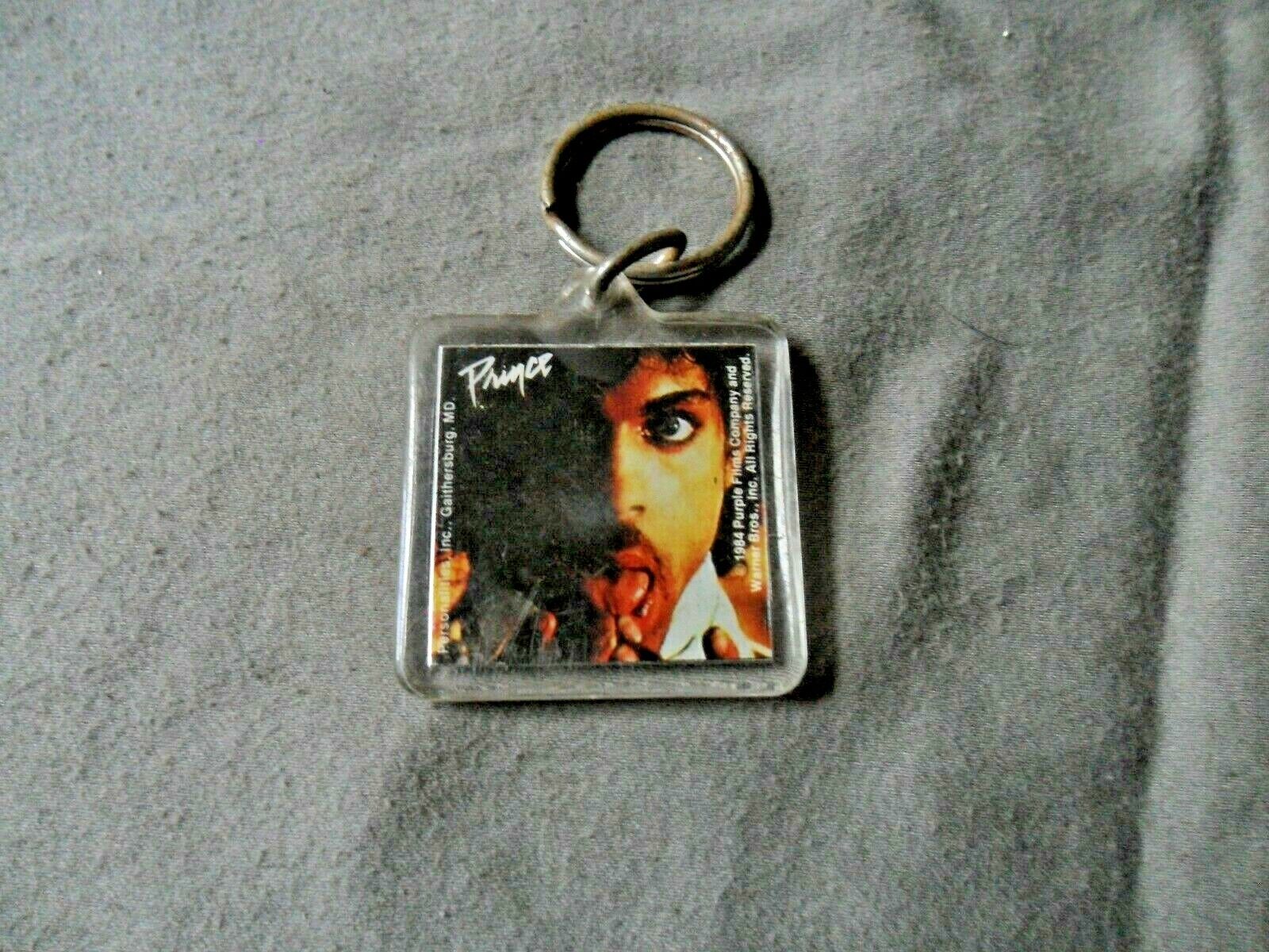 Key Chain/ Vintage  Prince New 1984 Purple Films Co. New NrMint