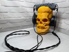 Stands for HeadPhones Skull Head Yellow