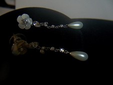 GIVENCHY WHITE FLOWER PEARL TEARDROP EARRINGS...