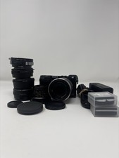 Sony NEX-7 24.3MP Mirrorless SLR. With batteries, charger, lenses, adapters