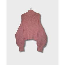 Pink turtleneck sweater