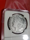 1904 S .90% Silver Morgan Dollar Coin In Protection Slab, Really Nice Example.