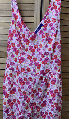 NWT Miley Cyrus Max Azria brand short romper with red and pink flowers.  Size L