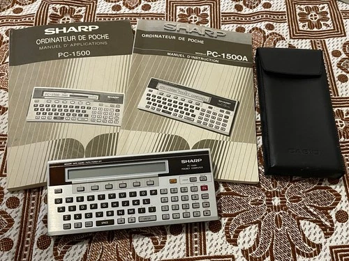 Sharp PC-1500A defective for parts with extension 4Ko (works)