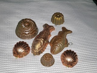 7 vintage copper jelly moulds