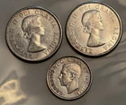(2) 1960 Canadian Silver Half Dollars and 1940 Quarter