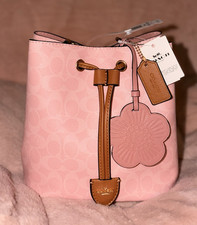 Coach Pink Signature Logo Drawstring Bucket B...