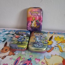 Pokémon JCC Lot 3 boîtes métal (tins) FR  +lots De Carte FR  Jeton .Occasion