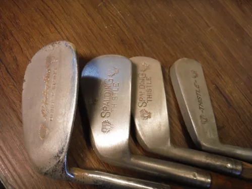 ANTIQUE WOODEN HICKORY SPALDING THISTLE GOLF 4 CLUB IRON MASHIE PUTTER set