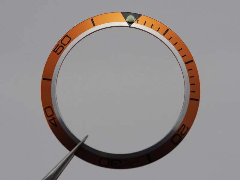 Orange bezel ring insert for watch cases 168 196 082SU1361 37.7mm