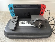 Nintendo Switch Original Console with Joy-Con, Dock, 125gb SD card, and Case