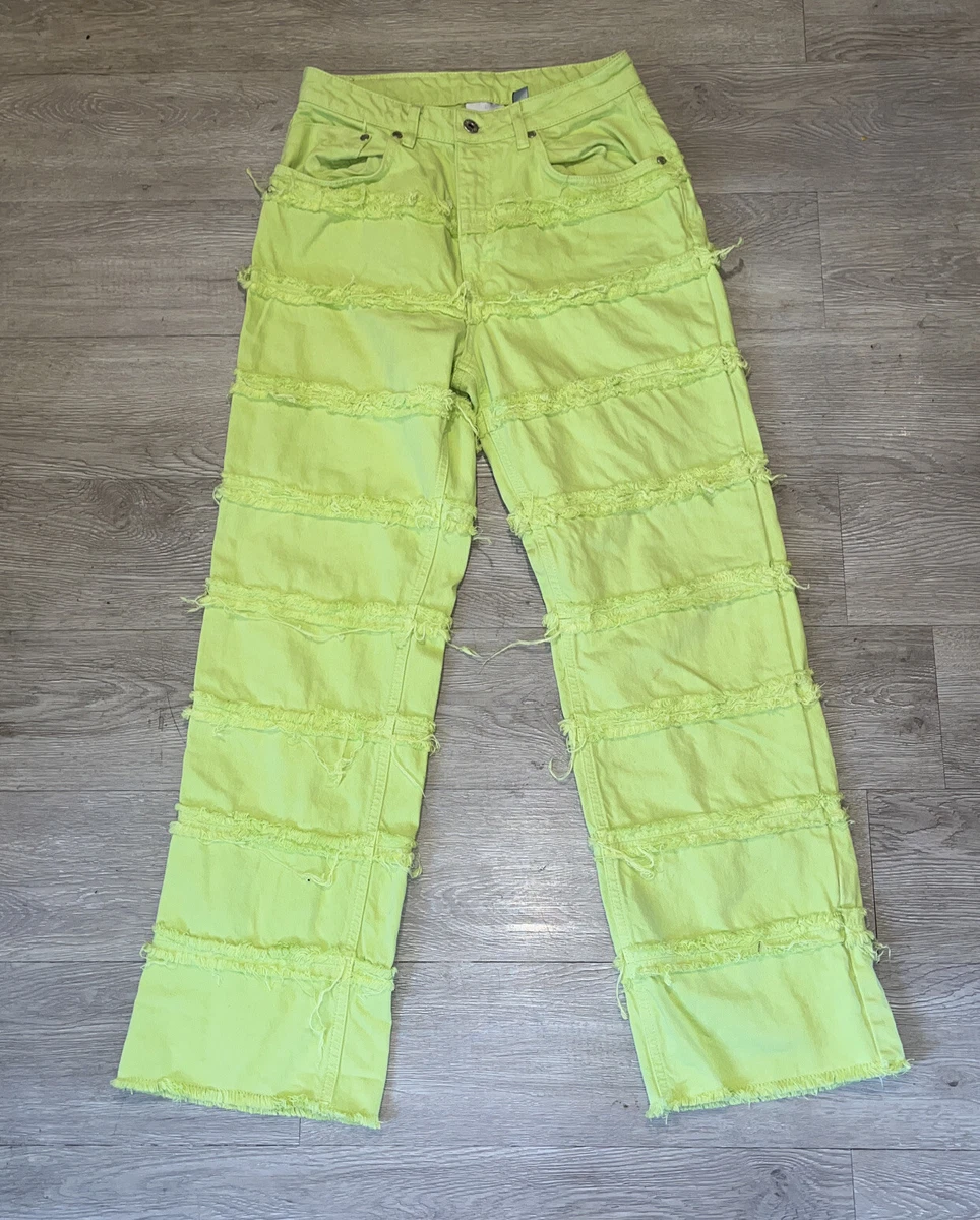 Neon yellow top ripped jeans
