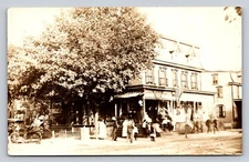 c1910 RPPC People Flag Horse Buggy Street View Real Photo P776