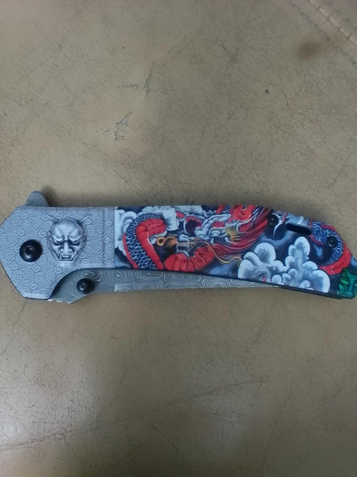 Wartech, Ast. Plegable. Cuchillo con cara de diablo y dragón de colores / mango de diseño de nube Foto 4 de 4