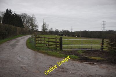 Photo 6x4 Payton : Track to Orchard A track heading off the road and into c2013