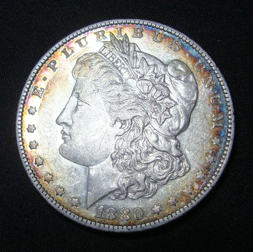 1880 O Morgan Silver Dollar  uncirculated with luster under the toning  ab963