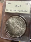 1885-  P  MORGAN , PCGS  MS63  RATTLER . Obv Champaign Toning. Needs CAC Review