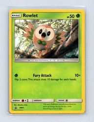 Rowlet SM01 Sun & Moon Black Star Promo Holo