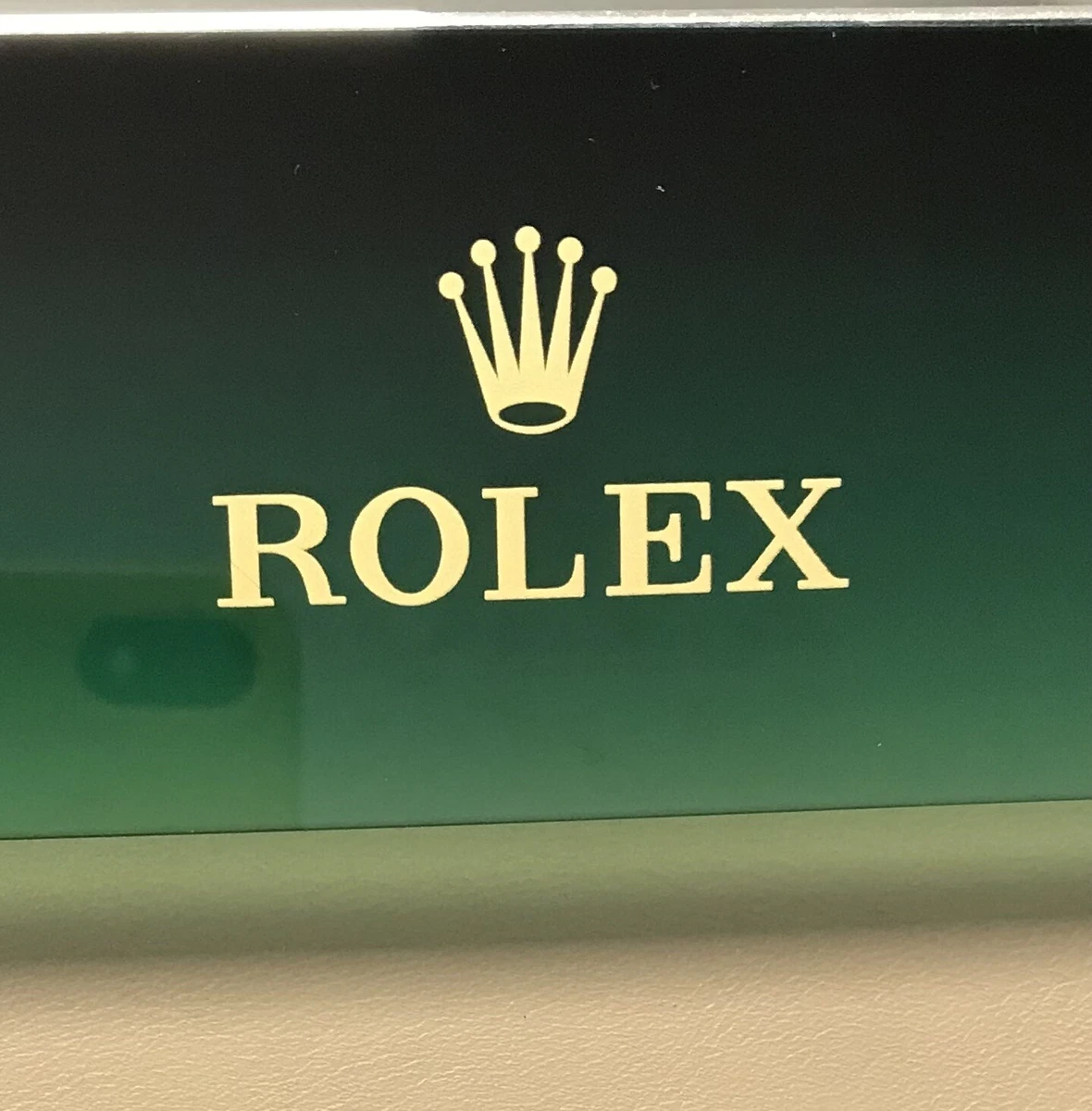 Rolex green background sale