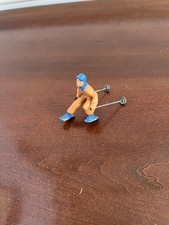 Vintage 1950's Cast Lead Orange Skier w/ Ski Poles No Skis. Figurine Barclay