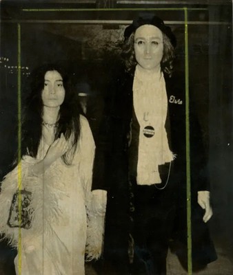A press photograph of John Lennon and Yoko Ono at the 17th Annual Grammys 1975