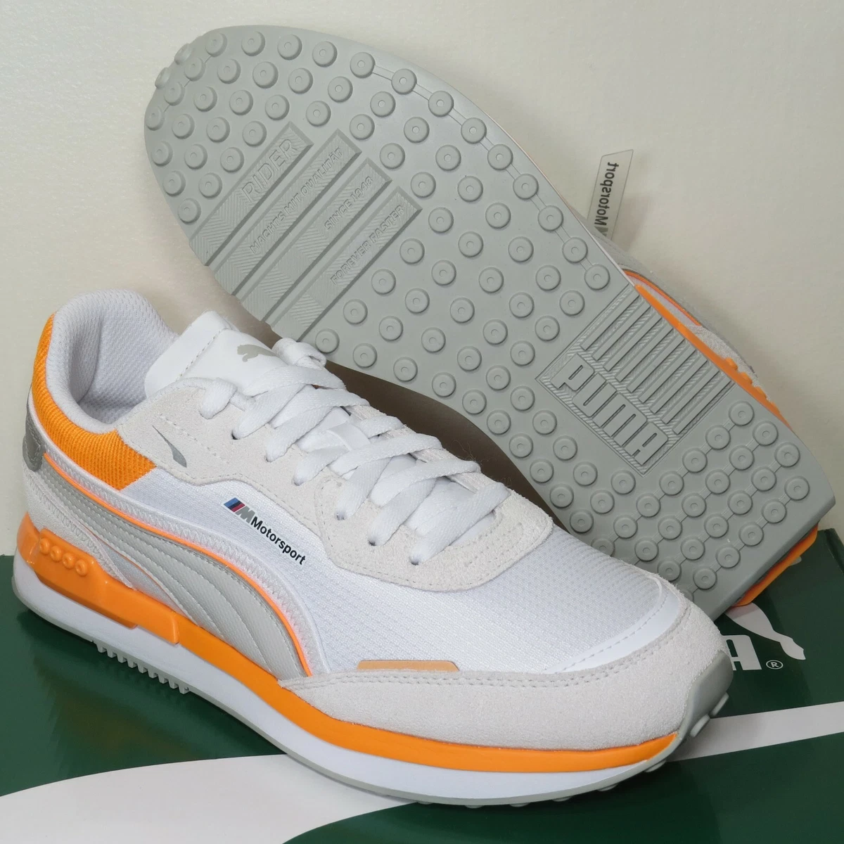 White and orange sales puma shoes