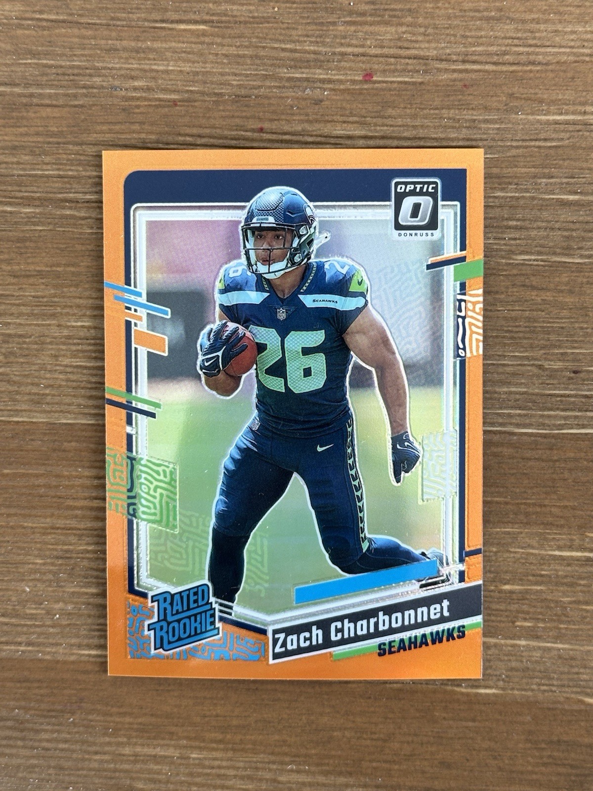 2023 Panini Donruss Optic Zach Charbonnet Rated Rookie Orange Prizm /249 #294