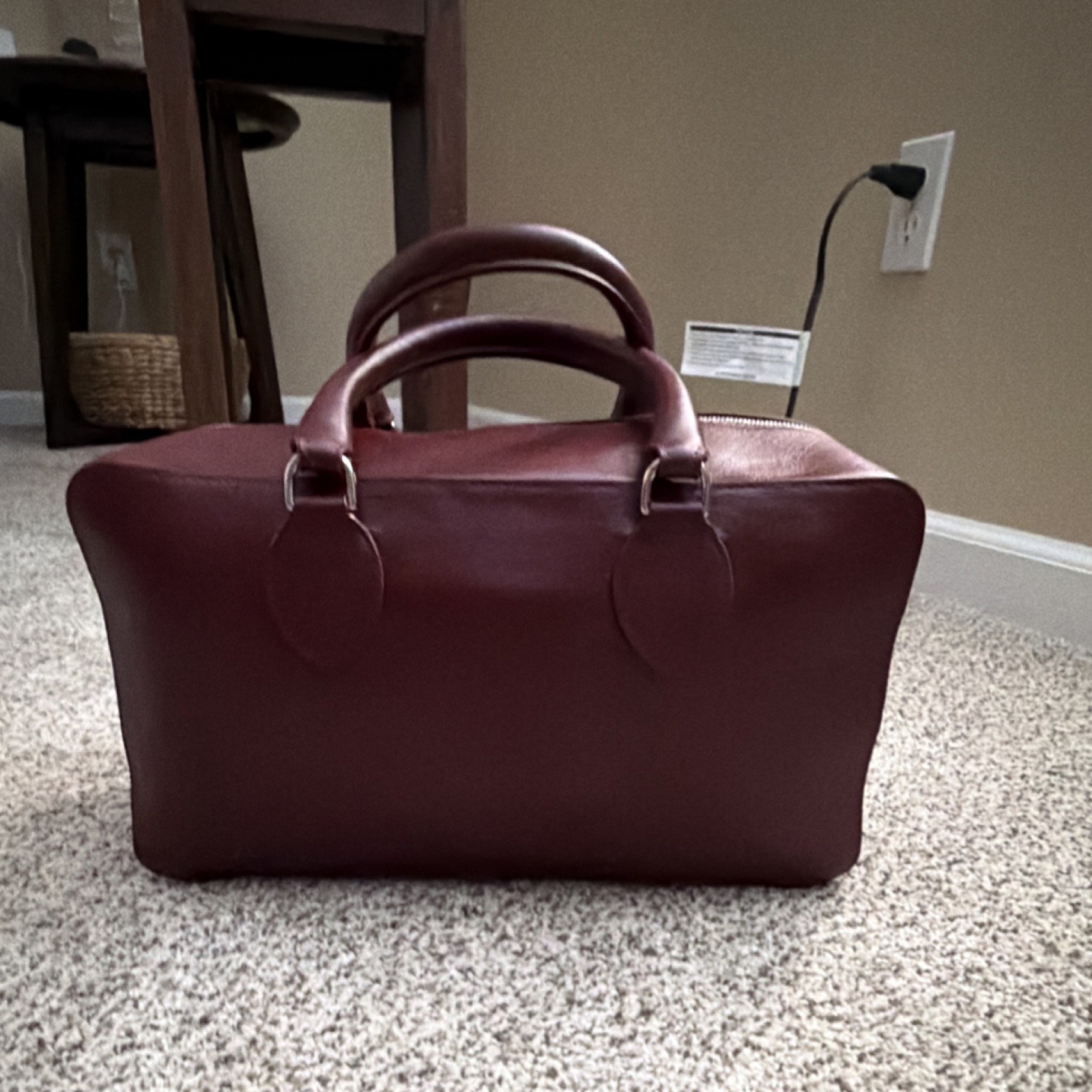 Reformation Patrizia burgundy leather top handle bag 