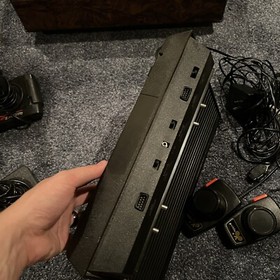 Atari 2600 Console With 16 Games, 4 Joysticks And 2 Paddles + Game Center