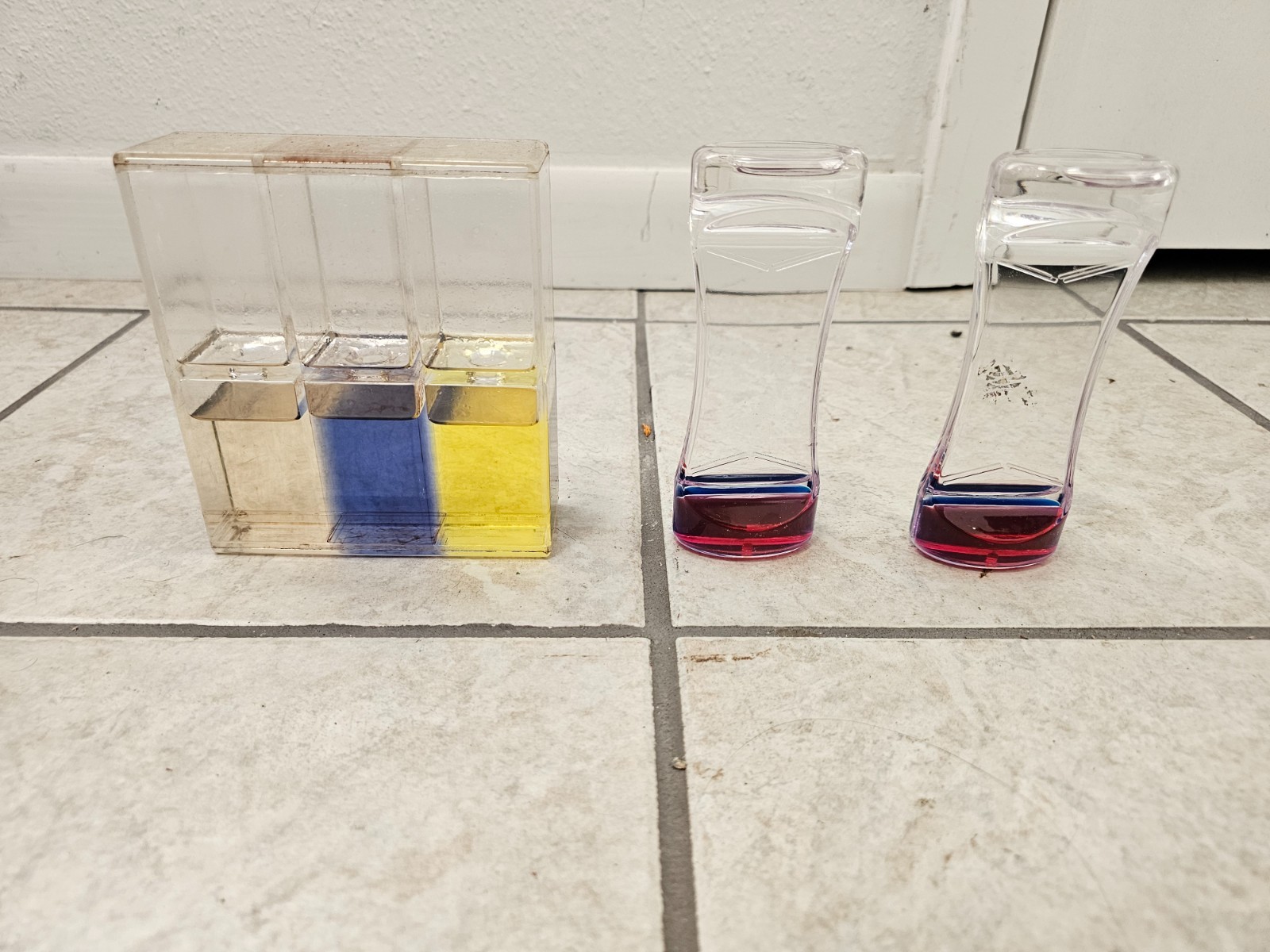 Triple Ooze Blacklight Reactive Pink Yellow Orange Baby Einstein sensory toy