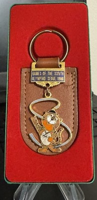 2 épingles Olympiques Séoul 1988 – Tigre Hodori, Drapeau Et Natation (vintage)
