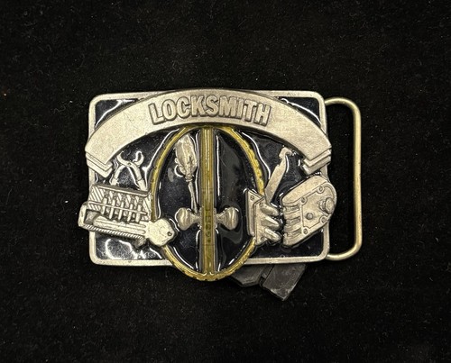 Vintage silver and black locksmith-themed belt buckle features a LOCKSMITH RARE