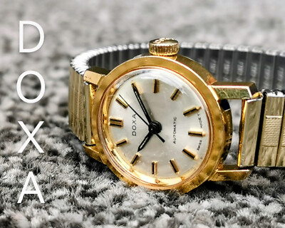 Vintage DOXA Swiss Automatikuhr, rundes silbernes Zifferblatt, vergoldetes Armband