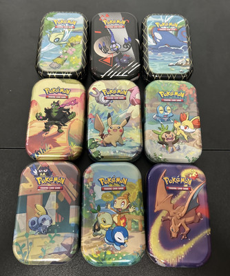 Lot of 9 Pokemon TCG Collectible Mini Tins EMPTY - Charizard, Pikachu, Celebi