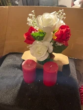 Floral centerpiece with candles