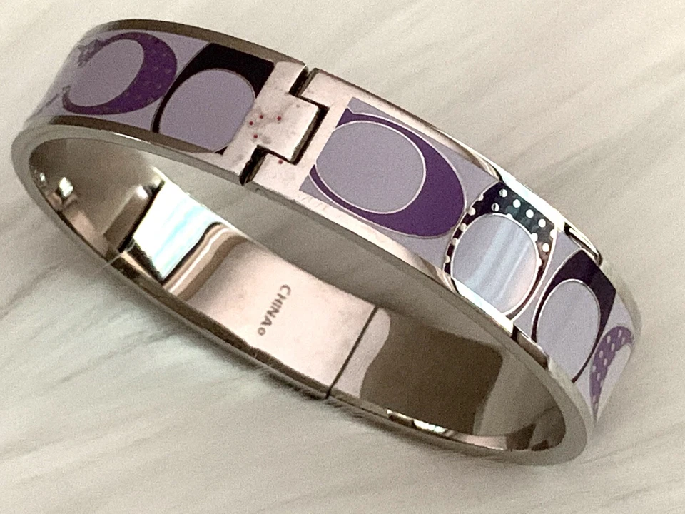 BRAZALETE ANCHO AUTÉNTICO COACH FIRMA LOGO ESMALTE MORADO Lunares Foto 4 de 4