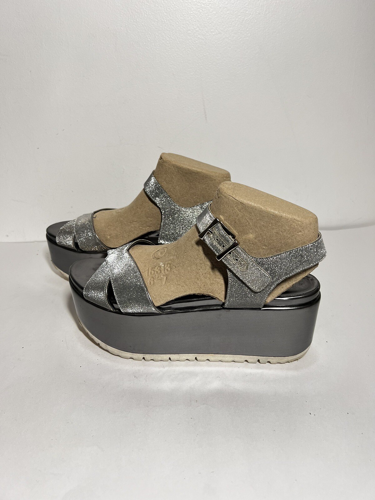 Stuart Weitzman EUC Silver Glitter Crosspath Flat… - image 1