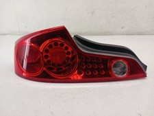 03-05 INFINITI G35 Coupe Driver Left Tail Light Lid Mounted OEM 26555AM825