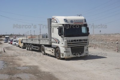 LKW Foto Sinotruk HOWO Silo-Sattelauflieger Kirgisistan weiß CIMC #w4dg