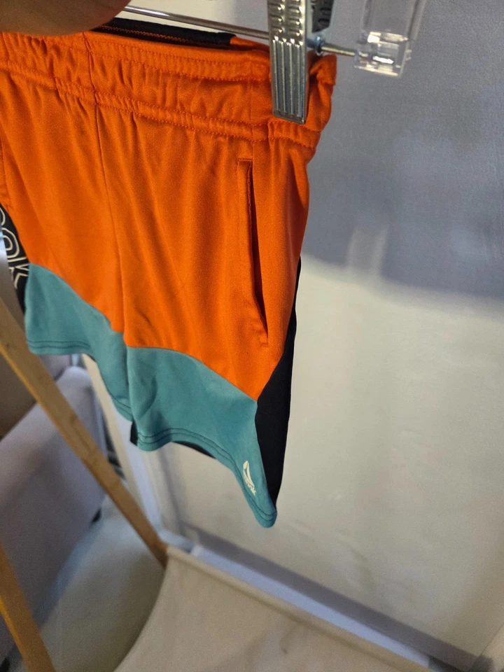 Pantalones Cortos Atléticos Reebok Niño Cómodos Naranja y Azul Teal 100% Poliéster Talla 4T Foto 4 de 4